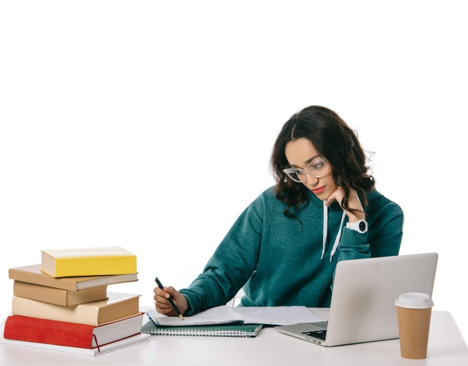 african american teen student studying at table isolated on white