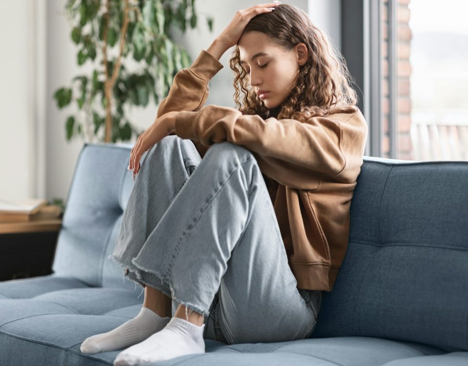 Teen Girl Feeling Sad Suffering From Depressing Thoughts At Home