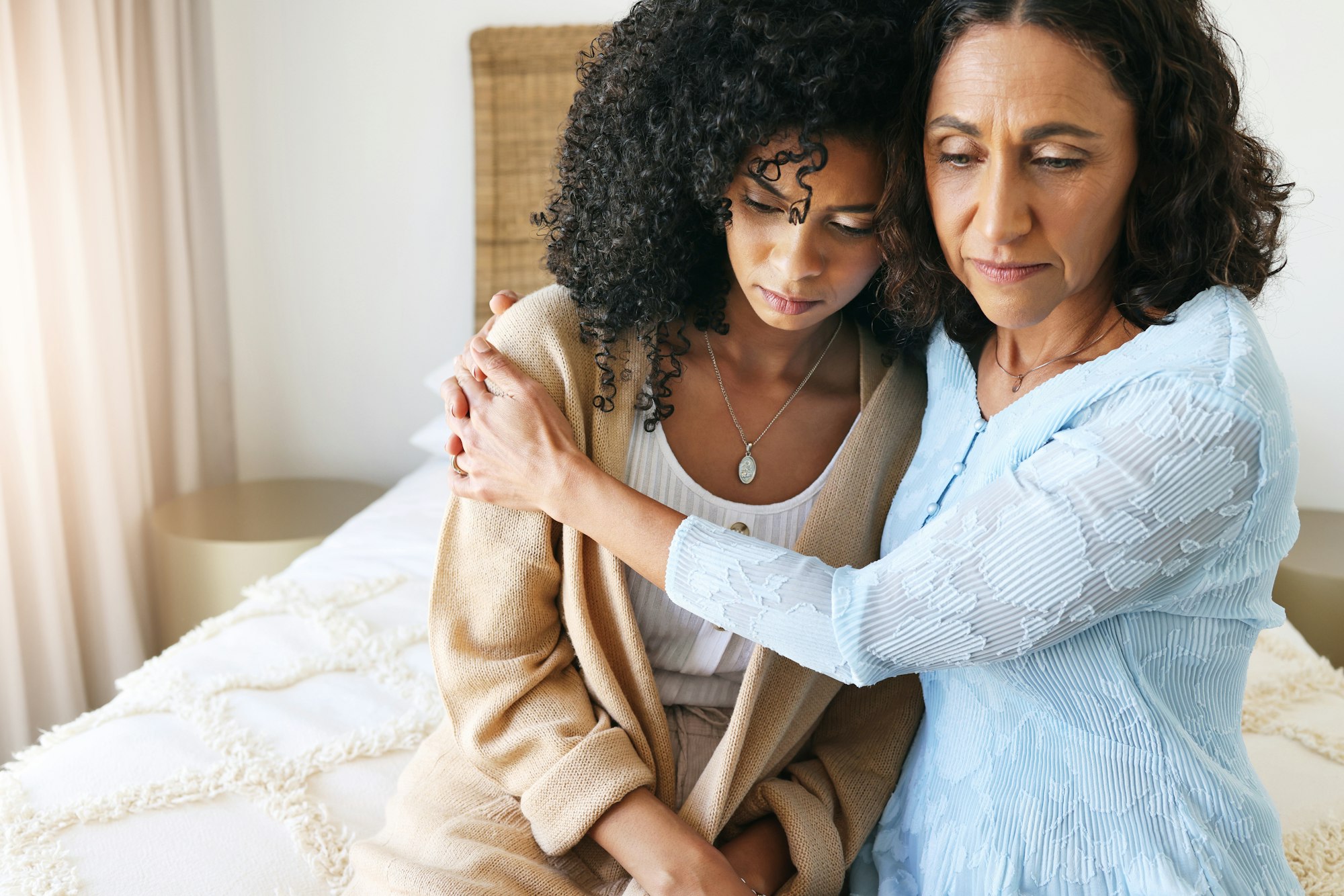 Black women hug, comfort and sad with empathy, kindness and mental health, love with grief and loss