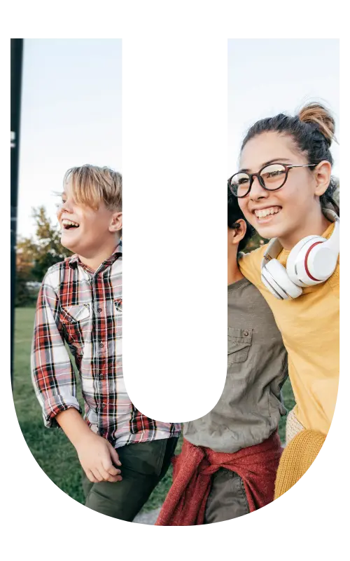 Image is in the shape of the letter "u" and features smiling young teenagers.